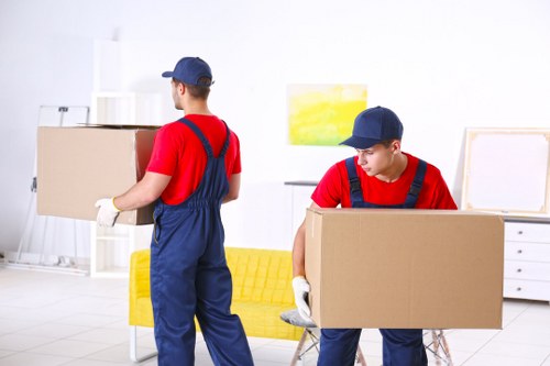 Removal van being loaded with household items during a move
