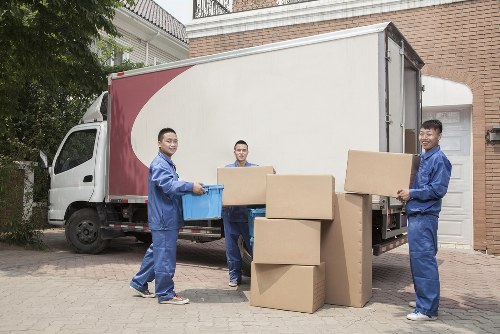 Removal van moving boxes and furniture in Hampstead