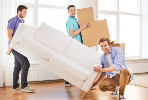 Local movers handling a residential relocation on a Hampstead street