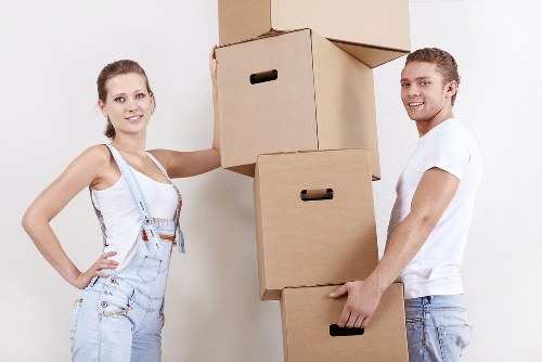 Furniture being carried through a typical Hampstead property entrance during a house removal